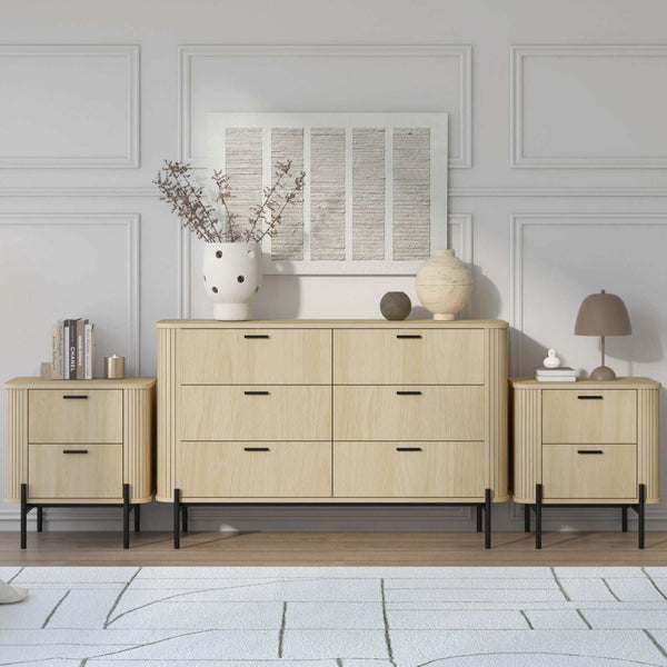 Fluted 6 drawer chest of drawers dresser with 2 bedside tables in stylish modern bedroom setup.