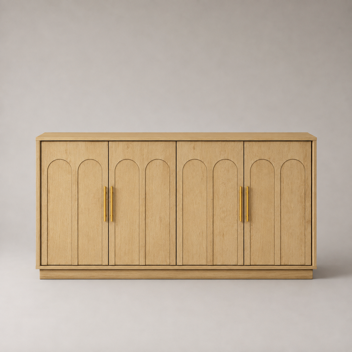 A light natural wood sideboard cabinet with four arched door panels and two slim vertical gold handles, photographed against a neutral light gray background.