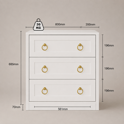 A white three-drawer chest with gold ring pulls, shown with dimension lines and labels indicating width, height, depth, and weight on a plain beige background.